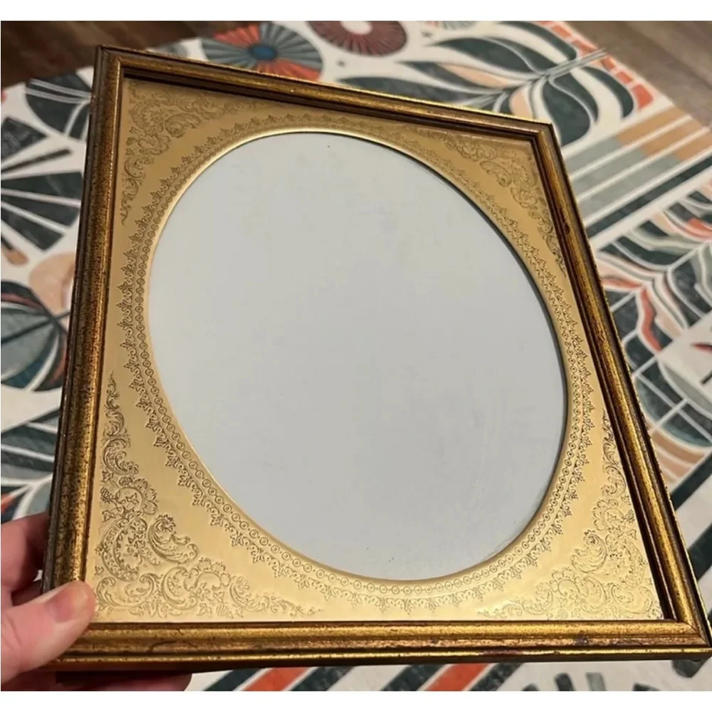 Vintage gold picture frame with brass oval embossed 12”x9.75”